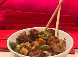 Manchurian with veggies with soy sauce and noodles